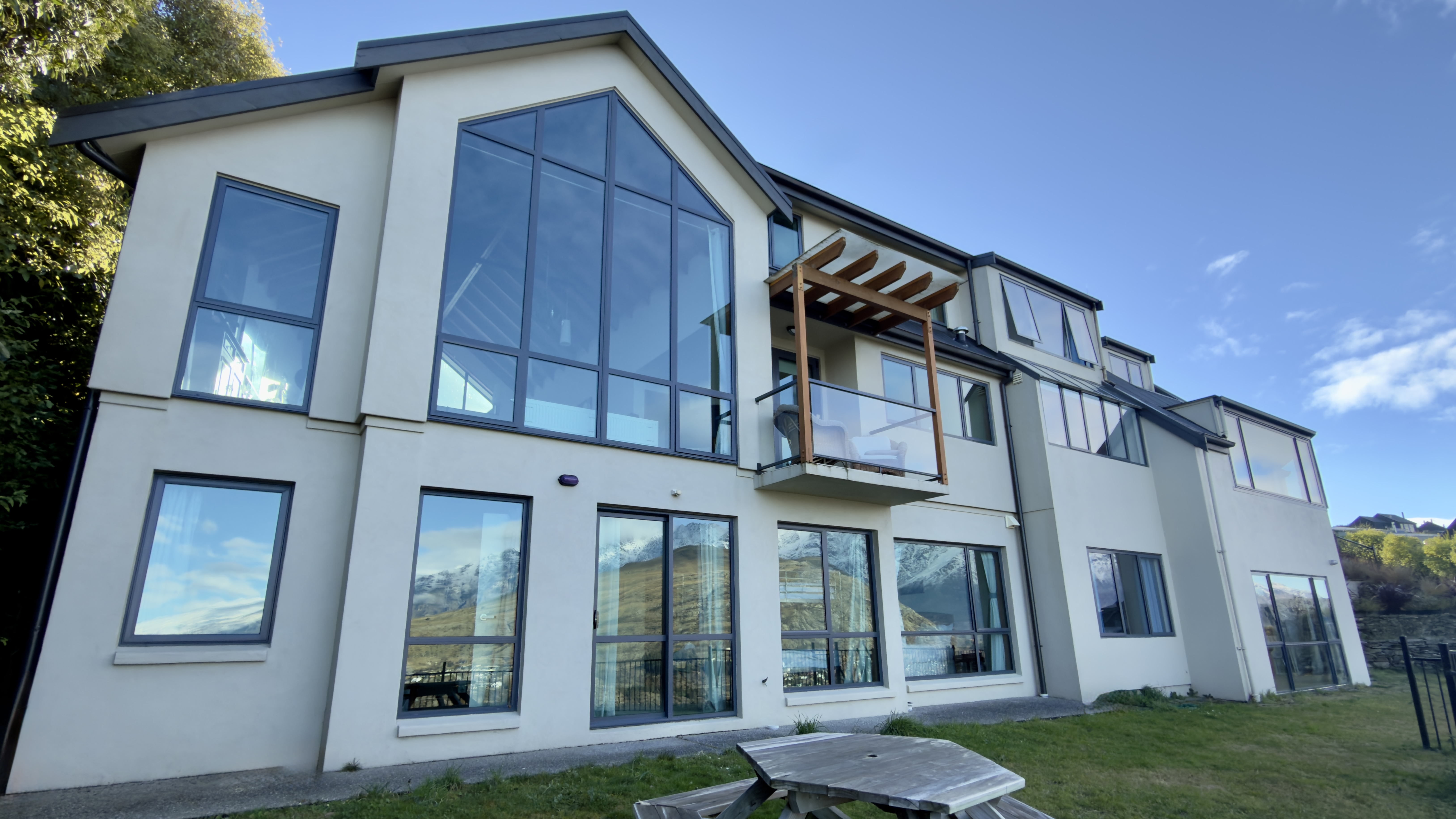 Warm lodge exterior for Queenstown accommodation